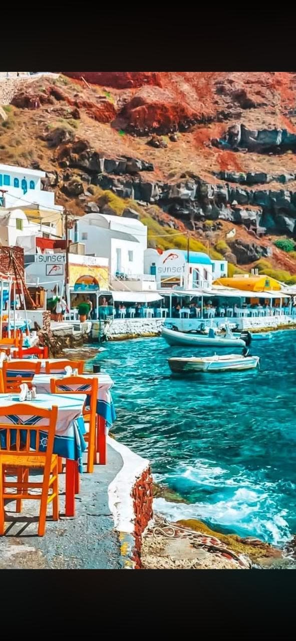 Colourful seaside taverna at Amoudi Bay, Santorini