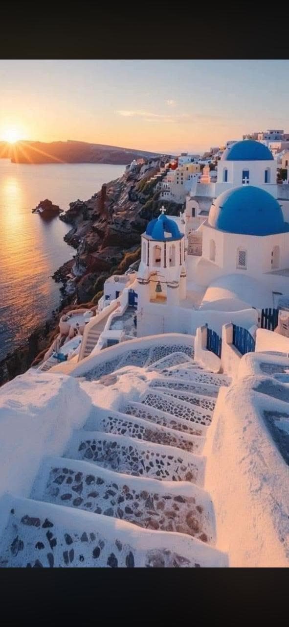 Oia at sunset over the Santorini caldera