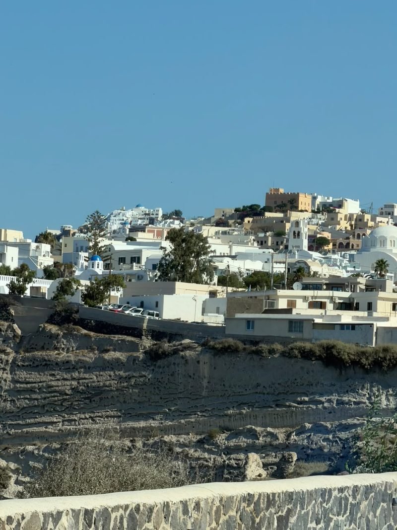Whitewashed Santorini village on the caldera cliffs